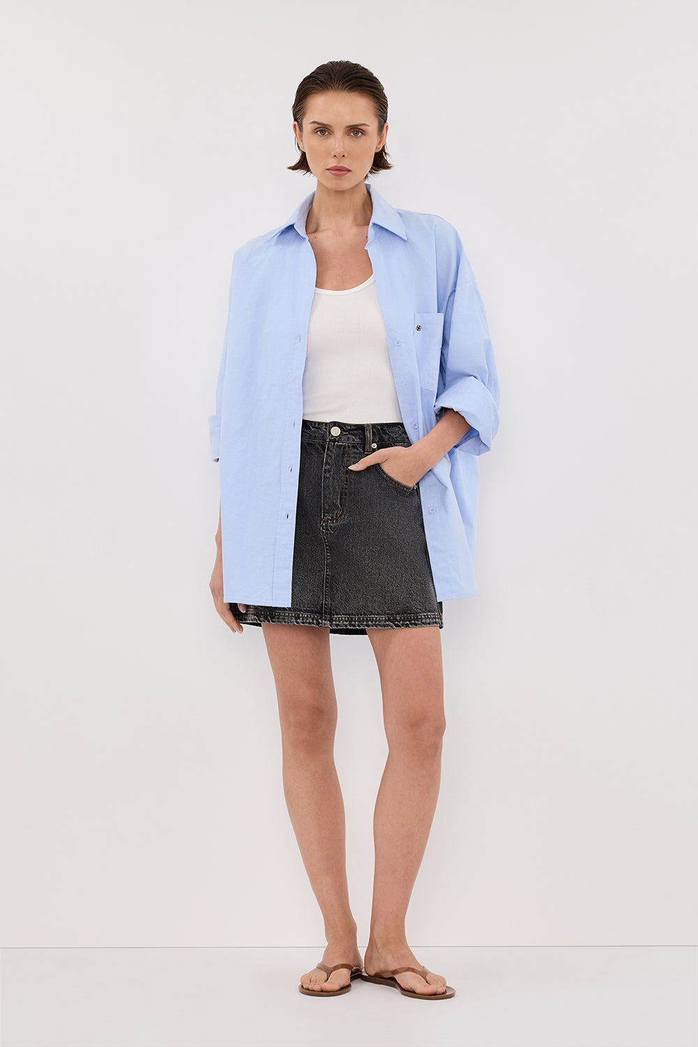 High Rise Washed Black Denim Mini Skirt with Pockets