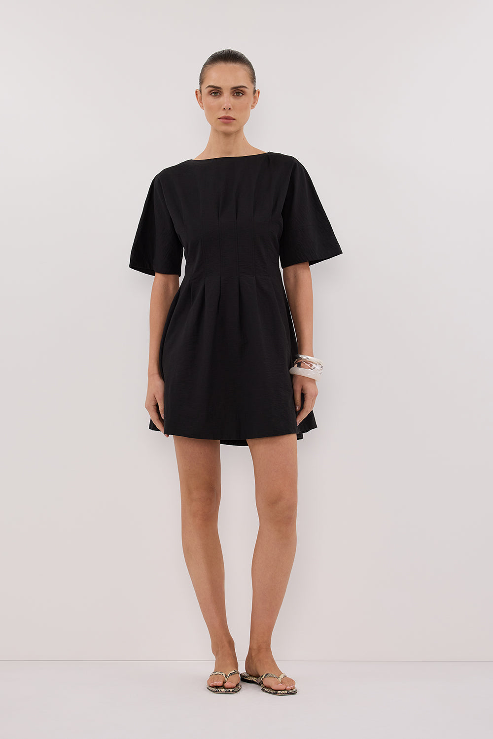 Black Sleeveless Mini Dress with Side Pockets & Pleat Detail