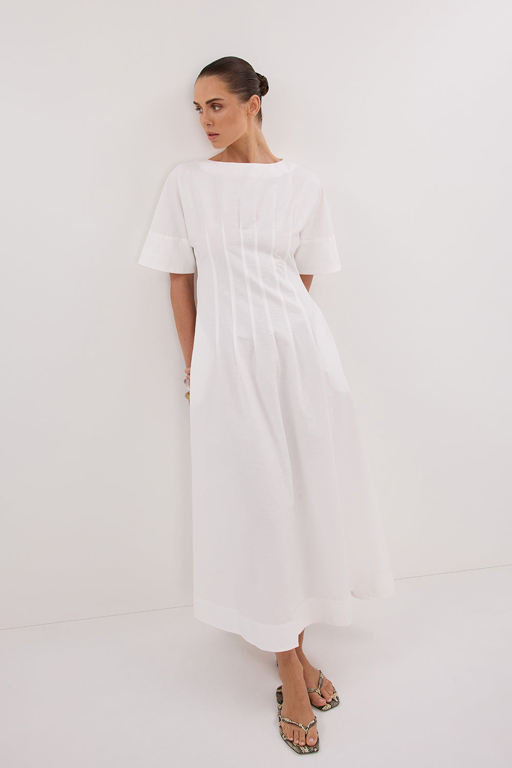 White Sleeved Midi Dress with Side Pockets & A-Line Silhouette