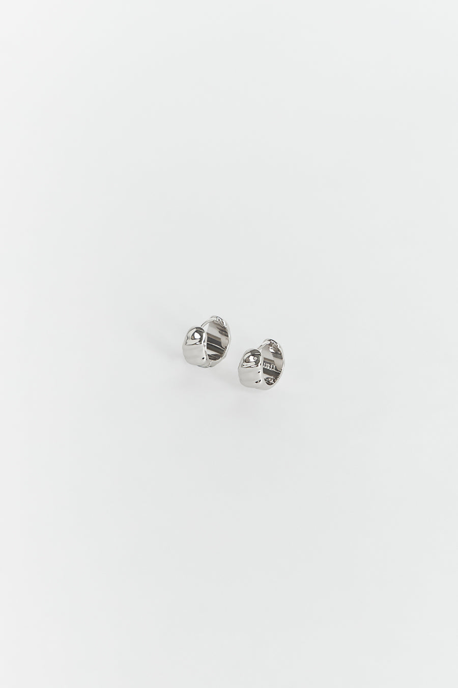 LUV AJ Hammered Silver Huggie Hoop Earrings